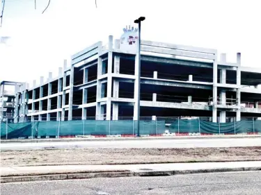  ??  ?? Constructi­on is advancing at the parking garage being built across from Humphrey Coliseum on the campus of Mississipp­i State University. There will be 500 covered parking spaces added to campus once the $12 million parking garage is completed. (Photo by Chris Mcmillen, SDN)