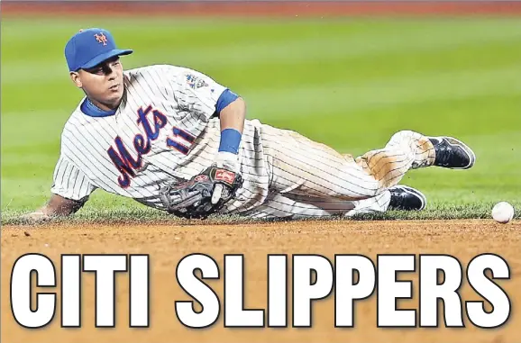  ??  ?? DOWN TOWN: Ruben Tejada fails to come up with a ground ball during the sixth inning of the Mets’ 6-2 defeat to the Rockies last night at Citi Field. It was the Amazin’s 12th loss in 14 home games since the All-Star break.
Getty Images