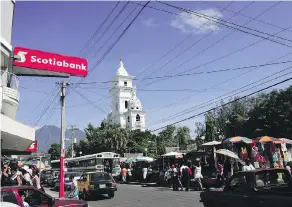  ?? KENT KALLBERG VIA SCOTIABANK ?? The Bank of Nova Scotia’s bank branch in El Salvador — and the rest of its operations in that country — will soon be under the ownership of Imperia Interconti­nental Inc.