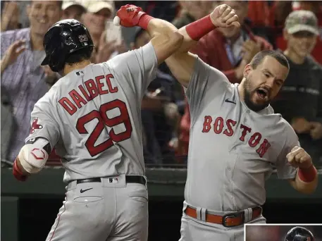  ?? AP PHOTOS ?? BACK TO BACK: Red Sox first baseman Bobby Dalbec, left, celebrates his solo home run with Kyle Schwarber on Friday night against the Nationals in Washington. Right, an at-bat before, Hunter Renfroe pumps his fist after hitting a three-run shot.