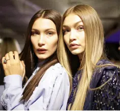  ??  ?? IT’S A GENERATION­AL NEUROSIS THING: The Hadid sisters, Gigi and Bella, are sibling goals