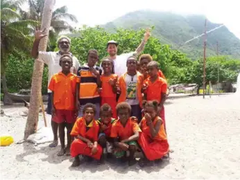  ??  ?? LEFT: Opening coconuts the hard way on Aneityum Island RIGHT: Chief John William of Mataso Island and the gaggle of 'Pikinini' in their bright school uniform