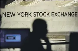  ?? SHARES OF Seth Wenig Associated Press ?? Microsoft, Apple, Amazon and Tesla fell at least 1.8% on Friday.