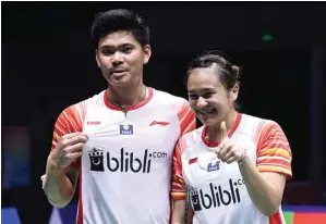  ?? WANG ZHAO/AFP ?? TUMPUAN: Praveen Jordan (kiri) dan Melati Daeva Oktavianti merupakan ganda campuran nomor satu di Indonesia. Mereka ditarget meraih emas Olimpiade.