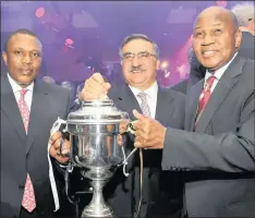  ?? PHOTO: ETIENNE ROTHBART. ?? Montecasin­o, Fourways, from left to right: Dr Irwin Khoza, chairperso­n, Orlando Pirates; Norman Adami, chairperso­n, SAB Miller, and Kaizer Motaung, chairperso­n, Kaizer Chiefs, at the Carling Black Label Cup launch in this file photo.