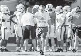  ?? SAM NAVARRO Special for the Miami Herald ?? Hurricanes head coach Mario Cristobal said: ‘We feel good about the walk-ons [at quarterbac­k and running back] but ... we will be active at those positions and a couple more.’