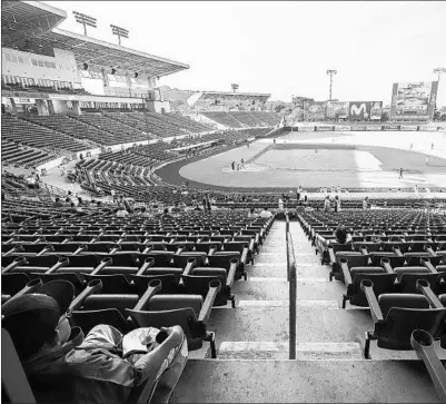  ?? ALFREDO ZUNIGA/AP PHOTOS ?? During the coronaviru­s pandemic, baseball continued in Nicaragua while schools, stores and concert halls also remained open.