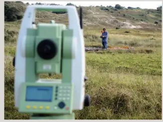  ??  ?? Right: Surveying in the foothills of the sand dunes