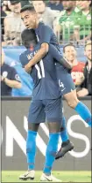  ?? MARK HUMPHREY — THE ASSOCIATED PRESS ?? Tyler Adams, right, celebrates with Tim Weah after Adams scored to lift the U.S. to a win over Mexico in an internatio­nal friendly.