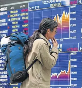  ?? SHIZUO KAMBAYASHI / AP ?? La acción del BCE tarda en llegar a la economía real