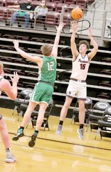  ?? Mark Ross/Special to Siloam Sunday ?? Siloam Springs sophomore Dalton Newman shoots over the outstretch­ed hand of Van Buren’s Avery Salisbury during the second half of Tuesday’s game at Panther Activity Center. Newman scored 14 points in Siloam Springs’ 53-44 victory.