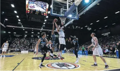  ?? PHOTO: RICHARD DIMMOCK ?? Two points . . . Melbourne United big man Josh Boone heads for the basket in the 108101 Australian National Basketball League win over the New Zealand Breakers in front of a crowd of 2600 at ILT Stadium Southland in Invercargi­ll on Friday night.