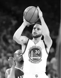  ??  ?? Stephen Curry #30 of the Golden State Warriors attempts a basket against Rodney Hood #5 of the Utah Jazz during Game One of the NBA Western Conference Semi-Finals at ORACLE Arena on May 2, 2017 in Oakland, California. - AFP photo