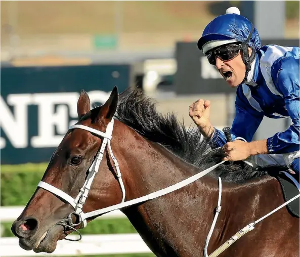  ??  ?? Champion mare Winx wins her 25th straight race as jockey Hugh Bowman celebrates yesterday at Randwick.