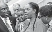  ?? Houston Chronicle file photo ?? Danny Ray Thomas’ son Damari, then 3, looks on as Thomas’ sister Marketta speaks during a news conference last year.