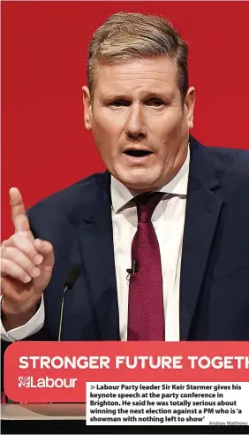  ?? Andrew Matthews ?? Labour Party leader Sir Keir Starmer gives his keynote speech at the party conference in Brighton. He said he was totally serious about winning the next election against a PM who is ‘a showman with nothing left to show’
