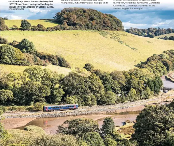  ?? RON WESTWATER. ?? It was direct interventi­on by Transport Minister Barbara Castle that took Cornwall’s LiskeardLo­oe branch off the closure list. The reason… social hardship. Almost four decades later, GWR 153377 leaves Terras crossing and heads up the east Looe river to...