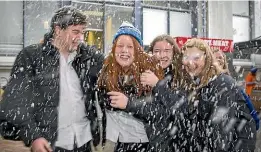  ?? MURRAY WILSON/STUFF ?? Jaymi Bradnock, left, Bronte Greer, Emma Brunton and Haylee Wallace, from Tararua College, check out UCOL’S snow machine.