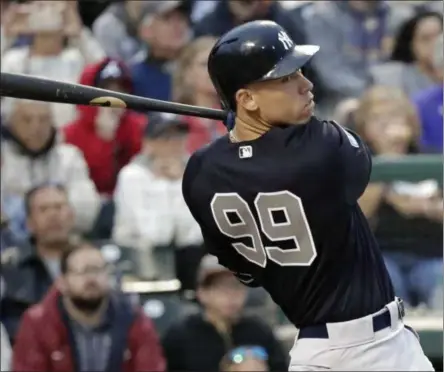  ?? JOHN RAOUX - THE ASSOCIATED PRESS ?? New York Yankees’ Aaron Judge hits a triple to drive in two runs in fifth inning of a spring baseball exhibition game against the Atlanta Braves, Monday, March 18, 2019, in Kissimmee, Fla.