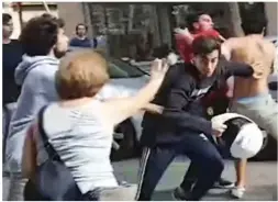  ??  ?? Street fights: Rival groups clash in Barcelona yesterday