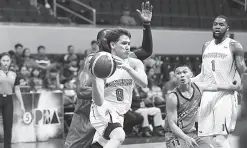  ??  ?? Robert Bolick (8) is the PBA Player of the Week. PBA Media Bureau