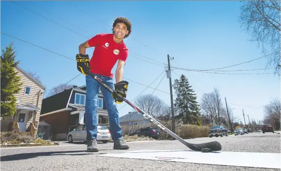  ?? WAYNE CUDDINGTON ?? Russell Jean-Pierre, 18, is an athlete and Grade 12 student at Nepean High School. He plays hockey and basketball, but all practices and workouts are home-based now.