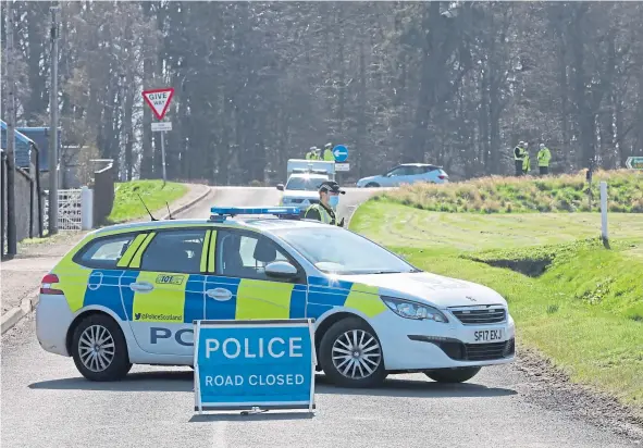  ??  ?? Emergency services attend the scene after a car crashed into a farmhouse, with a man taken to hospital with “serious injuries”.