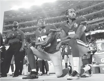  ?? MARCIO JOSE SANCHEZ / THE ASSOCIATED PRESS FILES ?? In the wake of the kneeling protest he staged during the national anthem last season, former San Francisco 49ers quarterbac­k and seasoned veteran Colin Kaepernick, right, has been unable to land a job anywhere in the NFL.