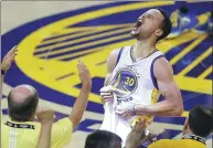  ?? AP FILE ?? Stephen Curry yells after the Warriors defeated the Oklahoma City Thunder in Game 7 of the 2016 NBA Western Conference final in Oakland, California. On Saturday, Curry signed a new $201 million deal with the Warriors.