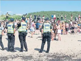  ??  ?? Beach last week as temperatur­es soar on Bank Holiday Monday