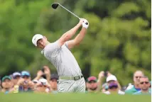  ?? ASSOCIATED PRESS ?? Rory McIlroy, of Northern Ireland, hits on the 10th hole during a practice round in preparatio­n for the Masters on Tuesday in Augusta, Ga.