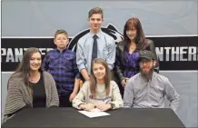  ?? Scott Herpst ?? Ridgeland senior soccer player Jade Ransom recently put her name on a letter of intent to continue her athletic career at Reinhardt University. Among those on hand for the signing ceremony were Celeste Ransom, Zack Willard, Silas Ransom, Damian Ransom and Debra Toornburg.