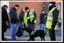  ??  ?? NO CHANCES: Dogs are used to search bags at Stamford Bridge