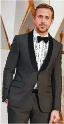  ?? Jordan Strauss / Associated Press ?? Ryan Gosling looks debonair in a traditiona­l Gucci tuxedo with a ruffled shirt.