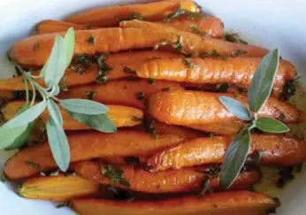  ?? CYNTHIA DAVID ?? The fresh, sweet taste of Nantes carrots will shine in this Roasted Nantes Carrots with Brown Butter recipe.