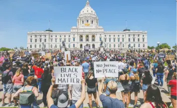  ?? — REUTERS ?? People protest at the state capitol building against the death in George Floyd, in St. Paul, Minn. on Sunday. Protests were held in many major U.S. cities.