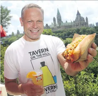  ?? JEAN LEVAC ?? André Schad runs clothing boutiques in the ByWard Market and is also the entreprene­ur behind Tavern on the Hill, a new summer patio in Major’s Hill Park that sells hotdogs, ice cream and alcohol.