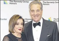  ?? AP/FILE ?? Speaker of the House, Nancy Pelosi (left) and her husband, Paul Pelosi, arrive at a dinner in Washington.