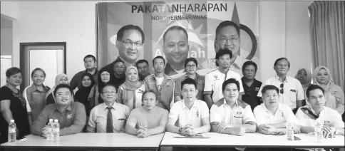  ??  ?? (Seated from left) Steve, Dr Teo, Mustapa, Ling, Roland, Dr Ting and Abun during a photo call with party members.