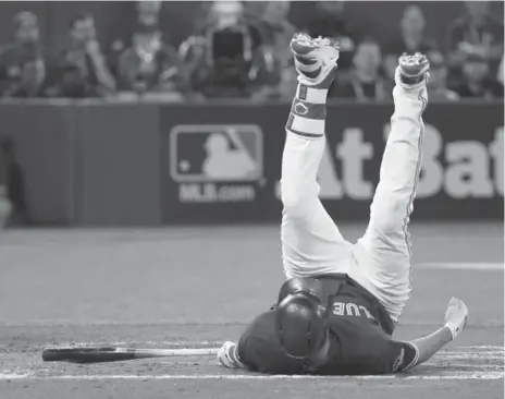  ?? STEVE RUSSELL/TORONTO STAR ?? Chris Colabello falls after swinging at a pitch during the third inning. Colabello had two hits and batted .375 in the series.