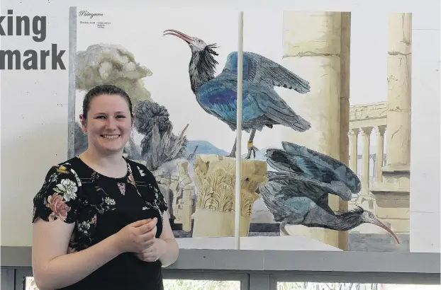  ?? PHOTO: LINDA ROBERTSON ?? History . . . Elaine Mitchell (20) with one of her natural historyins­pired works, Palmyrene, depicting the endangered Northern Bald Ibis in Syria.