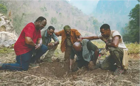  ?? — NETFLIX ?? Da 5 Bloods, directed by Spike Lee, stars Isiah Whitlock Jr., Norm Lewis, Clarke Peters, Delroy Lindo and Jonathan Majors. The film tells an engrossing story about the significan­t contributi­on of Black soldiers in Vietnam.