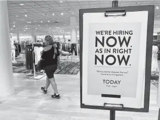  ?? Marta Lavandier / Associated Press file photo ?? The latest labor report Friday shows U.S. employers added just 194,000 jobs in September, a second straight tepid gain and evidence that the pandemic still has a grip on the economy.