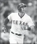  ?? TIM HEITMAN/ USA TODAY ?? Rangers third baseman Joey Gallo watches his two-run home run in the third inning of Texas’ 15-2 victory over the Chicago White Sox on Tuesday.