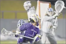  ?? Phoebe Sheehan / Times Union ?? Ualbany’s Tehoka Nanticoke scores vs. Siena on Feb. 8 in Albany. Both teams’ coaches agree the addition of a shot clock has been good for college lacrosse.