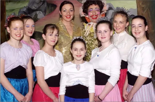  ??  ?? January 2001 - Carol Cleary as ÒColinÓ and Nicholas McCourt as Mother Goose with Lauren Doherty, Michelle O’Hare, Vanessa Mullally, Nicola Mulligan, Shauna Martin and Michelle Mullally taking part in the pantomime Mother Goose in the Town Hall.