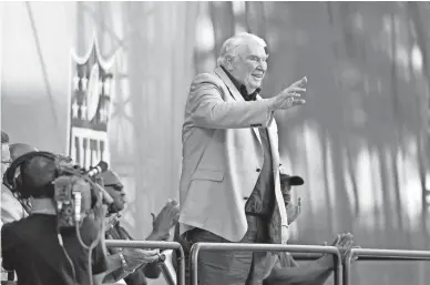  ?? DAVID RICHARD/AP ?? Former NFL head coach John Madden is introduced during the 2013 induction ceremony at the Pro Football Hall of Fame. Madden died Tuesday at the age of 85.