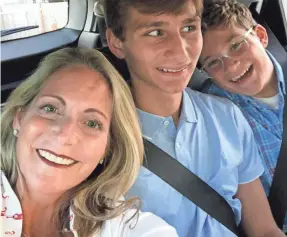  ?? ELISE TEDESCHI ?? Elise Tedeschi, now happy and healthy, clowns with her two sons. She was diagnosed wth stage 4 pancreatic cancer in 2012.