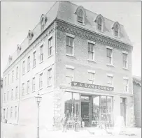  ?? SUBMITTED PHOTO ?? This picture of the WE Dawson building was taken in 1882 and will be featured in A Walk Through The Past: Great George Street to University and Back. The Dawson building has been home to many tenants over the years, including Lord’s Pharmacy, radio stations CFCY/Q-93/Magic 93, and will soon be home to McInnes Cooper (top three floors).