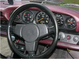  ??  ?? The ergonomics of the 911 dash and switchgear were the only real criticism of the model. The turbo badge on the engine-cover says it all